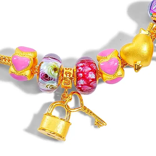 Gold charm bracelets for on sale sale